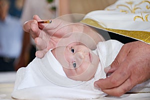 Annoyed baptized baby