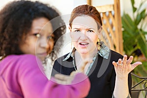 Annoyed European woman gesturing with hand