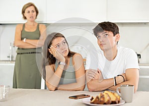 Woman swears at young married couple photo
