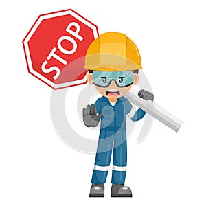 Annoyed industrial mechanic worker with stop sign. Engineer with his personal protective equipment. Safety first. Industrial