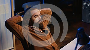 Annoyed developer exasperated after failing to remove all bugs while coding