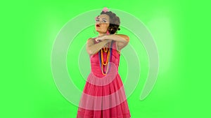 Annoyed woman gesturing in stress expressing irritation and anger. Green screen