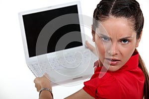 Annoyed woman with a laptop