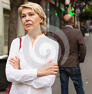 Annoyed woman man back