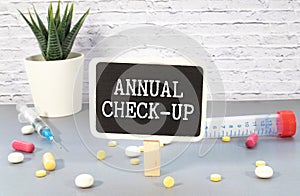 Annual Check-up text - medical, health and disease concept