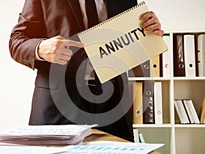 Annuity sign in the book that holds manager