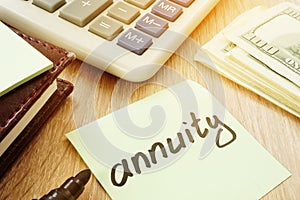 Annuity sign and calculator. Money for savings. photo