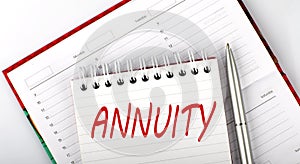 Annuity text on notebook on the diary,business