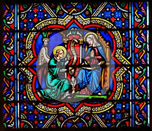 Annunciation Stained Glass in Notre Dame, Paris photo