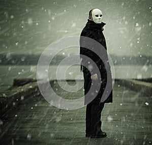 Man with white mask photo