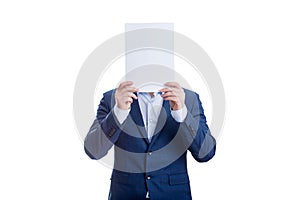 Anonymous businessman covering face with a blank paper sheet, like a mask to hide emotions. Incognito person hidden, isolated on