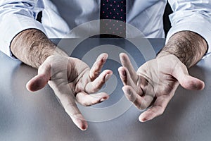 Anonymous businessman, salesman or politician hands for openness and discussion