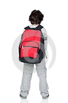 Anonymous child back with a heavy pack photo