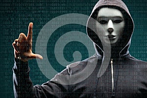 Anonymous computer hacker over abstract digital background. Obscured dark face in mask and hood. Data thief, internet