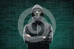 Anonymous computer hacker over abstract digital background. Obscured dark face in mask and hood. Data thief, internet