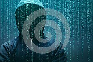 Anonymous computer hacker over abstract digital background. Obscured dark face in mask and hood. Data thief, internet