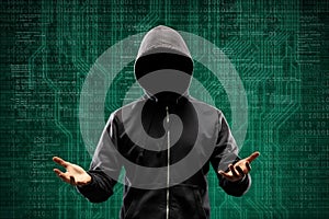 Anonymous computer hacker over abstract digital background. Obscured dark face in mask and hood. Data thief, internet