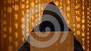 Anonymous Hacker with Binary Code and Cyber Attack Concept