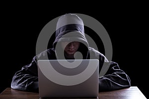 Anonymous hacker in the dark