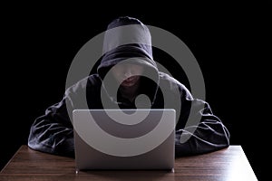 Anonymous hacker in the dark