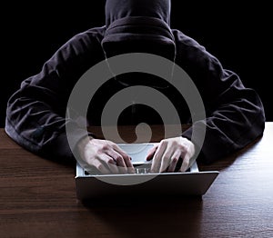 Anonymous hacker in the dark