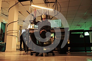 Anonymous hacker making hand gesture in augmented reality
