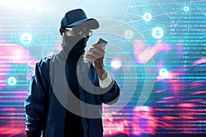 Anonymous hacker use mobile phone