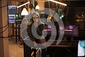 Anonymous hacking computer system, breaking into online server
