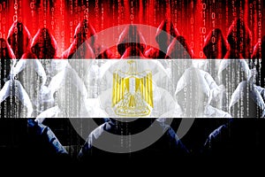 Anonymous hooded hackers, flag of Egypt, binary code - cyber attack concept