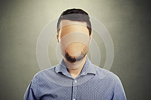 Anonymous man with blank face photo