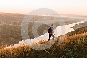 Anonymous traveler walking in countryside