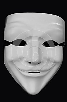 Anonymous white mask isolated on a black background