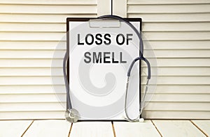 Anosmia, loss of smell. Loss of smell text on white paper