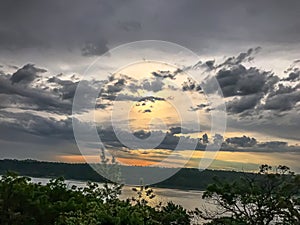 Another beautiful skyline with sunlight behind clouds.