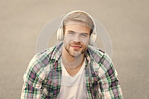 Another way of learning. Man handsome college student headphones. Online learning. Audio book concept. Educational