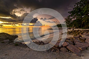 Anse Kerlan beach at the sunset