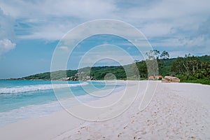 Anse Lazio Beach Praslin Island Seychelles, tropical beach with white sand and blue ocean with palm trees at the