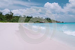 Anse Lazio Beach Praslin Island Seychelles, tropical beach with white sand and blue ocean with palm trees at the