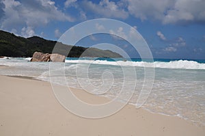 Anse Lazio, exotic beach with palm trees in praslin island, seychelles