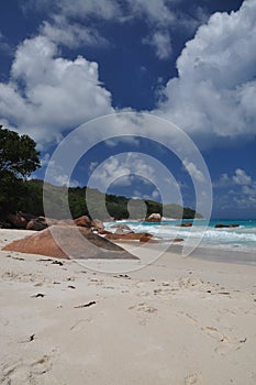 Anse Lazio, exotic beach with palm trees in praslin island, seychelles