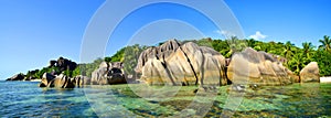 Anse Source d`Argent beach with big granite rocks in sunny day. La Digue Island, Indian ocean, Seychelles.