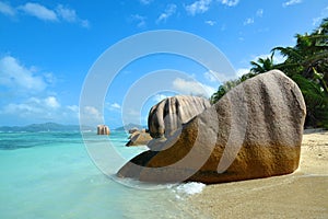 Anse Source d`Argent beach with big granite rocks in sunny day. La Digue Island, Indian Ocean, Seychelles.
