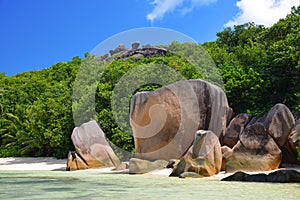 Anse Source d`Argent beach with big granite stones in La Digue Island, Indian Ocean, Seychelles.