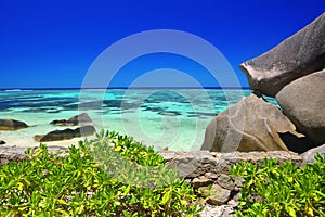 Anse Source d`Argent beach with big granite stones in La Digue Island, Indian Ocean, Seychelles.