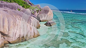 Anse Source D'Argent Beach in La Digue, Seychelles. Aerial view of tropical coastline on a sunny day