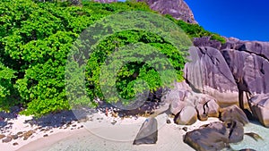 Anse Source D\'Argent Beach in La Digue, Seychelles. Aerial view of tropical coastline on a sunny day