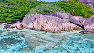 Anse Source D\'Argent Beach in La Digue, Seychelles. Aerial view of tropical coastline on a sunny day