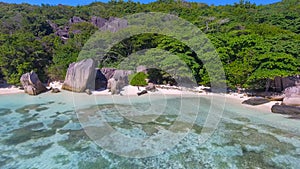 Anse Source D\'Argent Beach in La Digue, Seychelles. Aerial view of tropical coastline on a sunny day