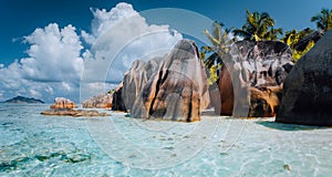 Anse Source d`Argent - Dreamlike, paradise beach with unique bizarre granite boulders, shallow lagoon. La Digue island