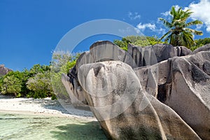 Anse Source d`Argent - granite rocks at beautiful beach on tropical island La Digue in Seychelles